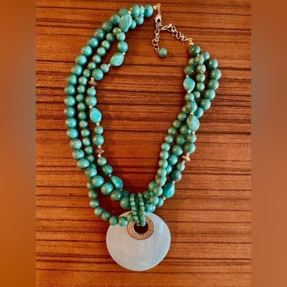 80’s Turquoise blue bead necklace w/ mother  of pearl disc pendant.